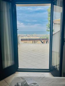 Letto o letti in una camera di Hotel Piccolo Paradiso Del Gargano
