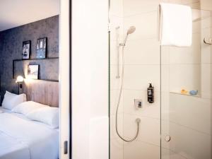 Ein Bett oder Betten in einem Zimmer der Unterkunft ibis Zurich Adliswil
