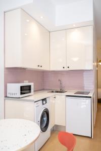 Kuchnia lub aneks kuchenny w obiekcie Oriente Suites