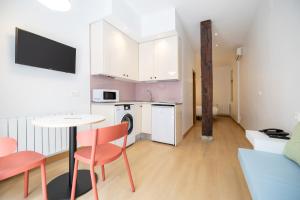 Kuchnia lub aneks kuchenny w obiekcie Oriente Suites