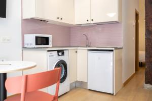 Kuchnia lub aneks kuchenny w obiekcie Oriente Suites