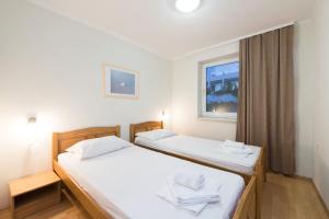Postel nebo postele na pokoji v ubytování Hotel Rooms Roccia