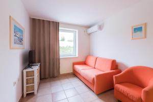 TV a/nebo společenská místnost v ubytování Hotel Rooms Roccia