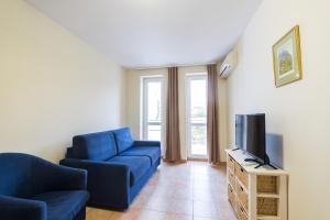TV a/nebo společenská místnost v ubytování Hotel Rooms Roccia