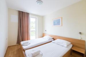 Postel nebo postele na pokoji v ubytování Hotel Rooms Roccia