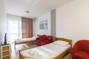 Postel nebo postele na pokoji v ubytování Hotel Rooms Roccia