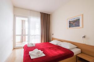 Postel nebo postele na pokoji v ubytování Hotel Rooms Roccia