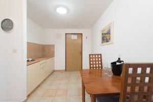 Kuchyň nebo kuchyňský kout v ubytování Hotel Rooms Roccia