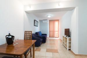 TV a/nebo společenská místnost v ubytování Hotel Rooms Roccia