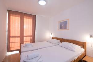 Postel nebo postele na pokoji v ubytování Hotel Rooms Roccia