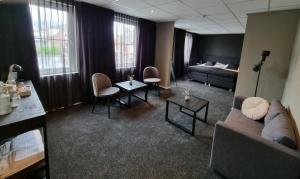 Posezení v ubytování Hotel Café de Sport