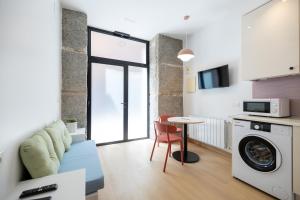 Kuchnia lub aneks kuchenny w obiekcie Oriente Suites