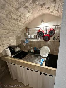 Kuchyňa alebo kuchynka v ubytovaní La Chicca di Ostuni + 12 fotografií