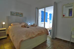 En eller flere senge i et værelse på Casa Vista Bella - Sleeps 9 + 55 billeder