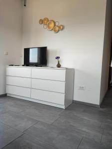 A television and/or entertainment centre at Villa Maya