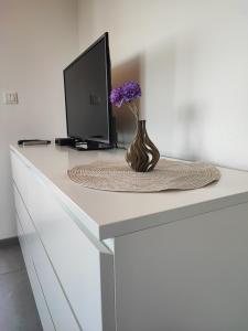 A television and/or entertainment centre at Villa Maya