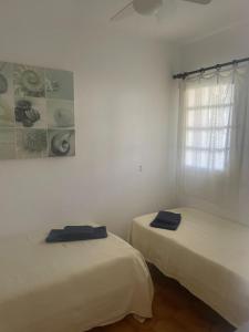 Łóżko lub łóżka w pokoju w obiekcie 2 Bedroom Apartment , Son Bou