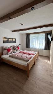 Postel nebo postele na pokoji v ubytování Ferienwohnungen LODGE-B