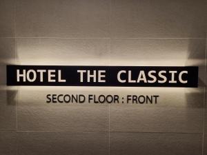 a sign that reads hotel the classic second floorllorllorllorllorllorllor at Hotel The Classic in Ulsan