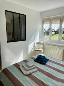 Łóżko lub łóżka w pokoju w obiekcie Chambres d'Hôtes Lefoulon