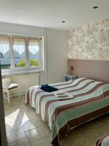 Łóżko lub łóżka w pokoju w obiekcie Chambres d'Hôtes Lefoulon