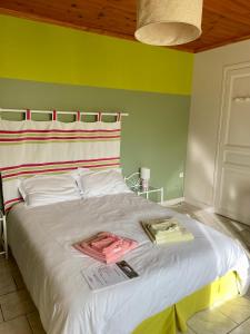 Łóżko lub łóżka w pokoju w obiekcie Chambres d'Hôtes Lefoulon