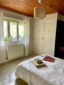 Łóżko lub łóżka w pokoju w obiekcie Chambres d'Hôtes Lefoulon