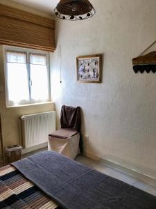 Łóżko lub łóżka w pokoju w obiekcie Chambres d'Hôtes Lefoulon