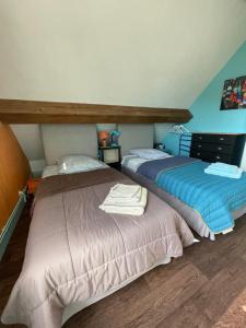 Łóżko lub łóżka w pokoju w obiekcie Chambres d'Hôtes Lefoulon
