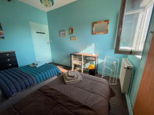 Łóżko lub łóżka w pokoju w obiekcie Chambres d'Hôtes Lefoulon