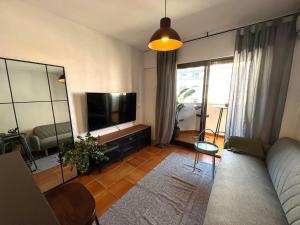TV a/nebo společenská místnost v ubytování Apartamento Botero