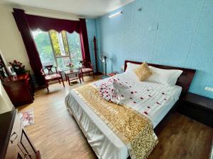 Postel nebo postele na pokoji v ubytování Indochina Airport Hotel Ha Noi