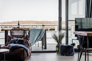 Hausboot Küstennebel 2的休息区