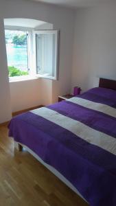 Ένα ή περισσότερα κρεβάτια σε δωμάτιο στο Getaway Seaside Sweet