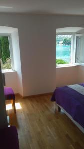 Ένα ή περισσότερα κρεβάτια σε δωμάτιο στο Getaway Seaside Sweet