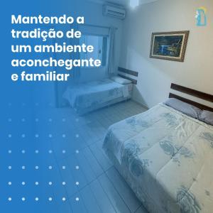 מיטה או מיטות בחדר ב-Hotel Pousada Dona Ana