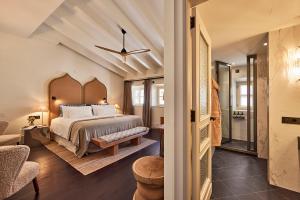 Postel nebo postele na pokoji v ubytování Puro Grand Hotel