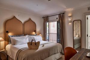 Postel nebo postele na pokoji v ubytování Puro Grand Hotel