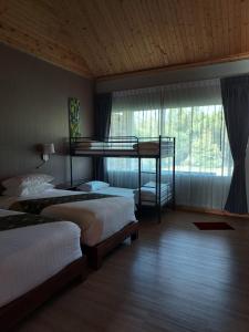 Krevet ili kreveti na kat u jedinici u objektu Coconut Garden Retreat