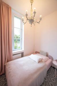 Ένα ή περισσότερα κρεβάτια σε δωμάτιο στο Loft 3 +7 φωτογραφίες