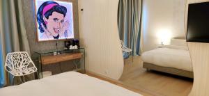 Postel nebo postele na pokoji v ubytování Mirada Hotel