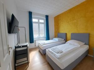 Postel nebo postele na pokoji v ubytování Hotel Tempelhof - City-Messe-Arena