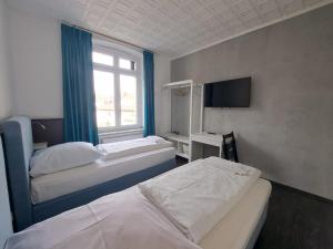 Postel nebo postele na pokoji v ubytování Hotel Tempelhof - City-Messe-Arena