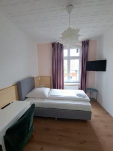 Postel nebo postele na pokoji v ubytování Hotel Tempelhof - City-Messe-Arena