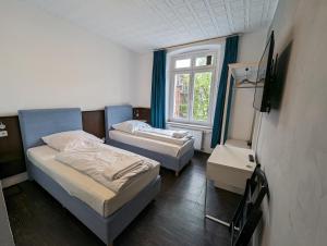 Postel nebo postele na pokoji v ubytování Hotel Tempelhof - City-Messe-Arena