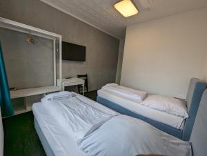 Postel nebo postele na pokoji v ubytování Hotel Tempelhof - City-Messe-Arena