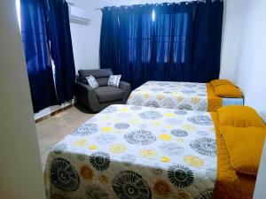 Ένα ή περισσότερα κρεβάτια σε δωμάτιο στο Depa cómodo ideal en viajes al centro de Tampico