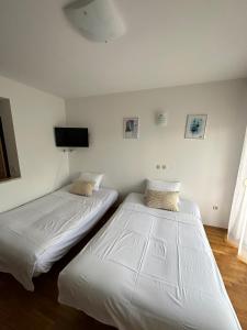 Ένα ή περισσότερα κρεβάτια σε δωμάτιο στο Apartment Bella with free parking