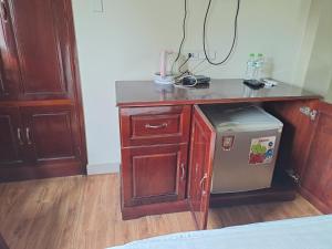 Kuchyň nebo kuchyňský kout v ubytování Indochina Airport Hotel Ha Noi