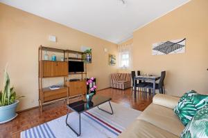 a living room with a couch and a table at Wonderful Bay in Lagos